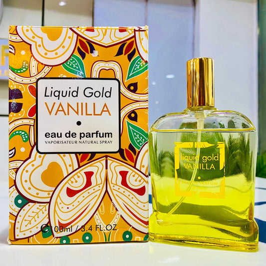 Liquid Gold Vanilla eau de parfum bottle and packaging on a reflective surface.